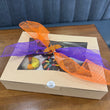 Load image into Gallery viewer, Trick or Treat Dozen Donuts
